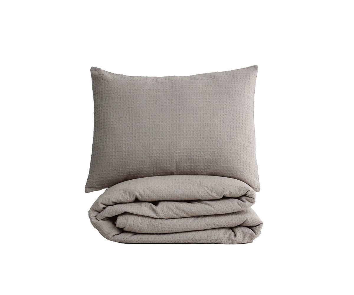 Parure housse de couette et taies d'oreiller en tissu gaufré