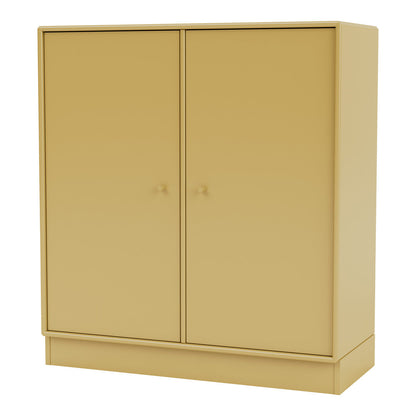 Armoire 1118 - 2 portes laquées, base sur socle