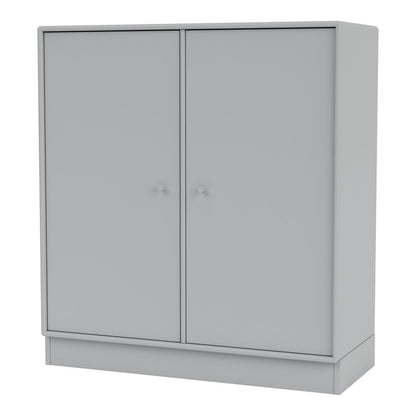 Armoire 1118 - 2 portes laquées, base sur socle