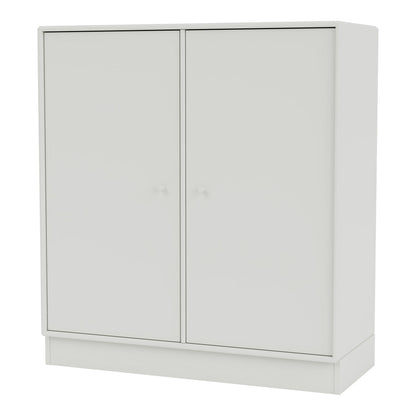 Armoire 1118 - 2 portes laquées, base sur socle
