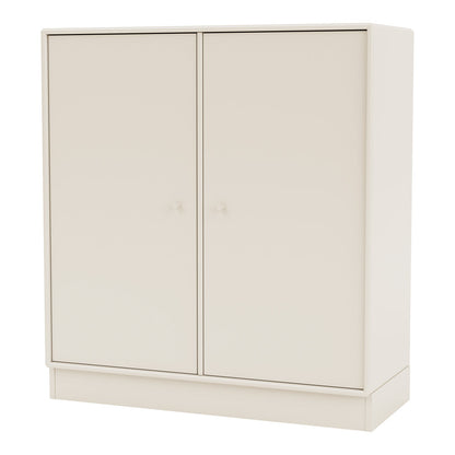 Armoire 1118 - 2 portes laquées, base sur socle