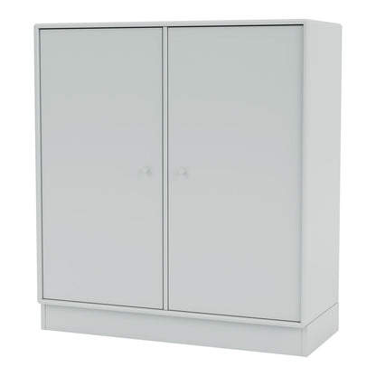 Armoire 1118 - 2 portes laquées, base sur socle