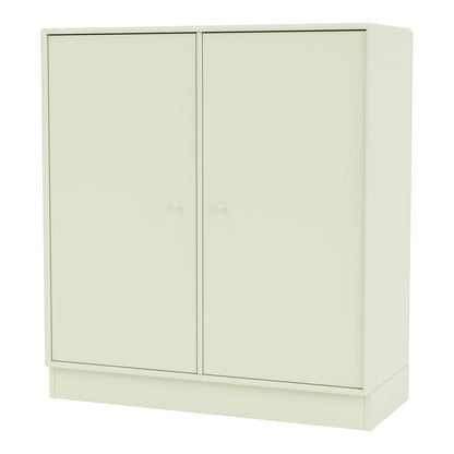 Armoire 1118 - 2 portes laquées, base sur socle